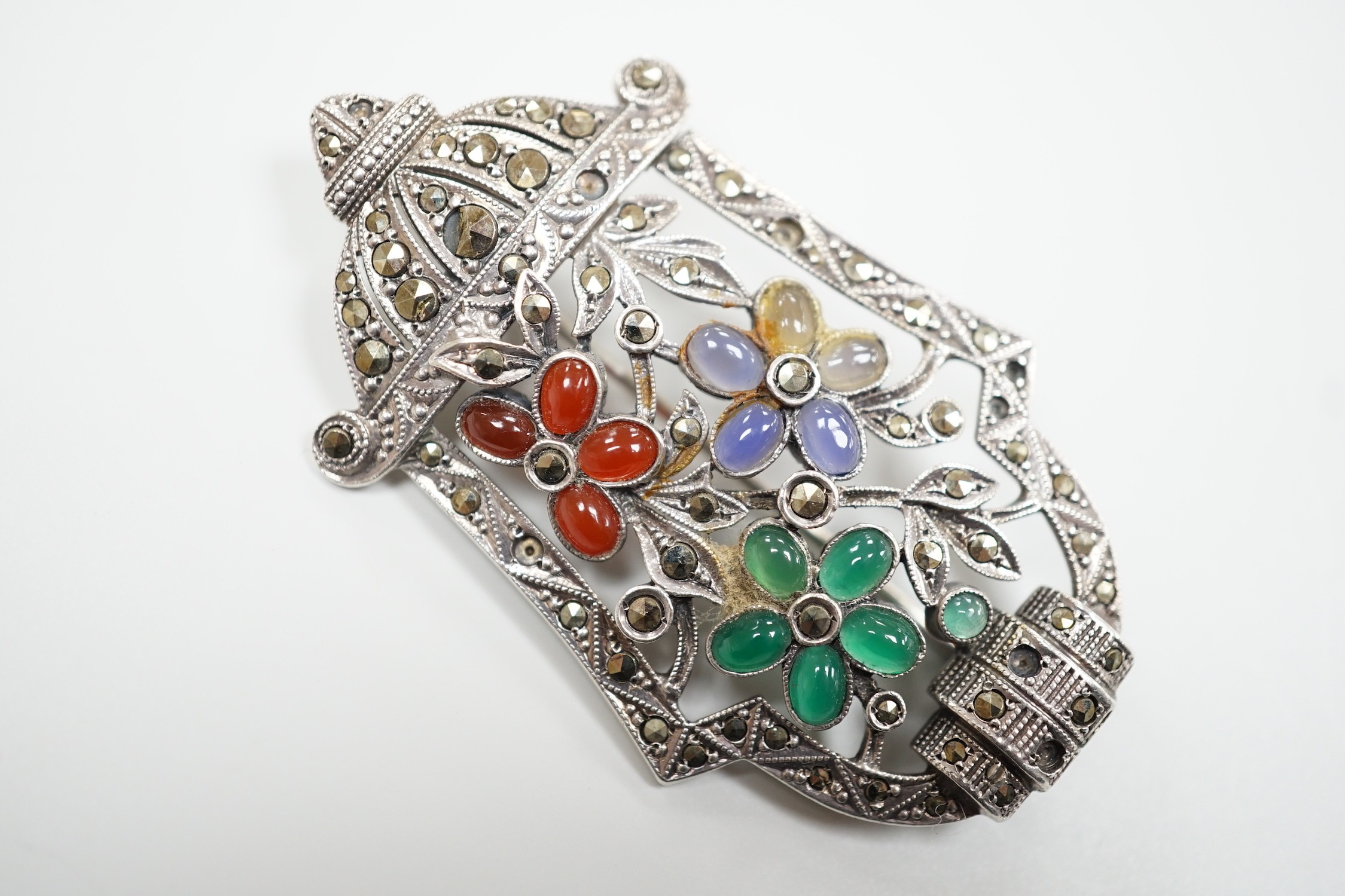 A white metal, marcasite and cabochon stone cluster set brooch, 51mm.